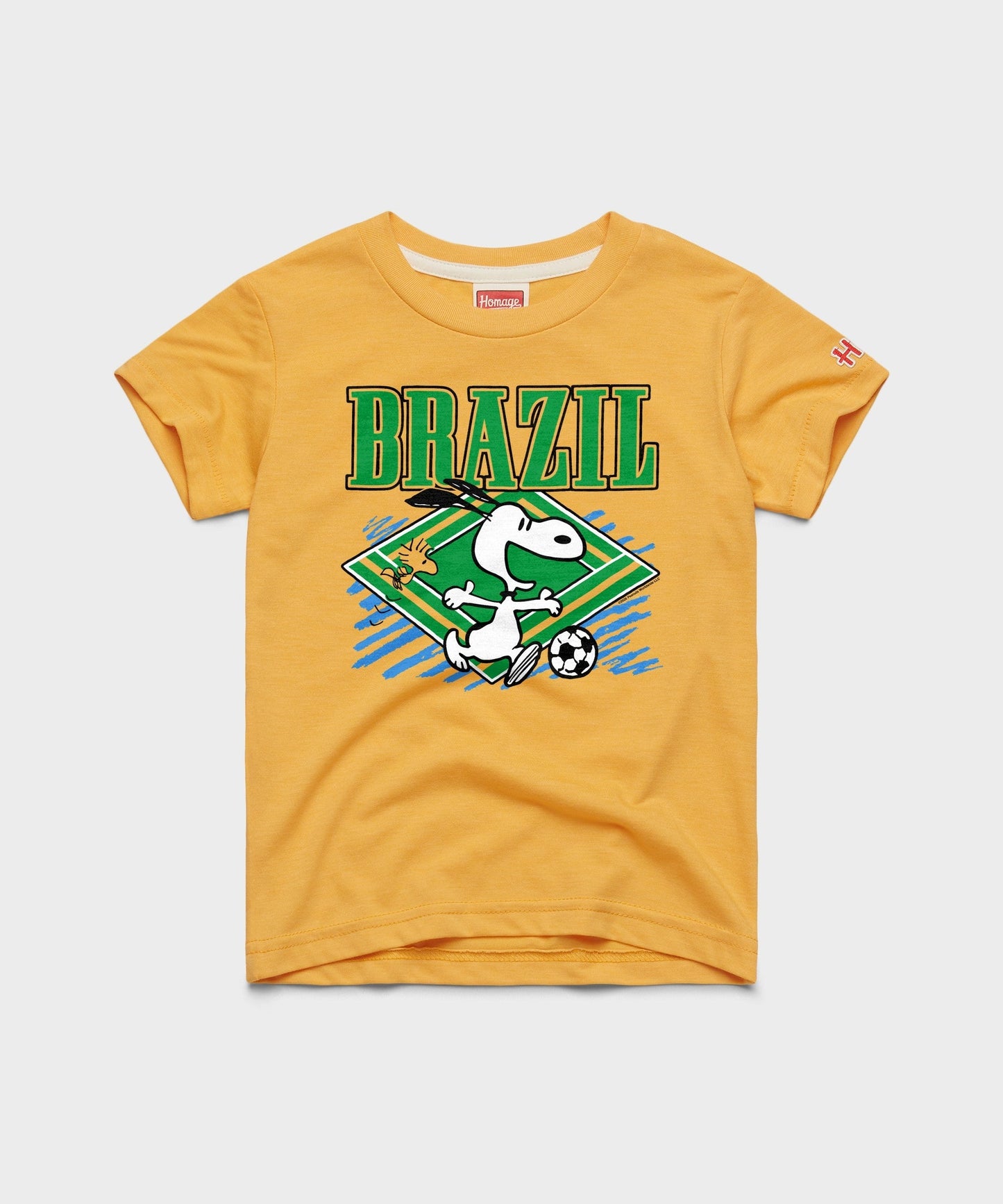 Gold youth t-shirt featuring Snoopy with a soccer ball on the front chest