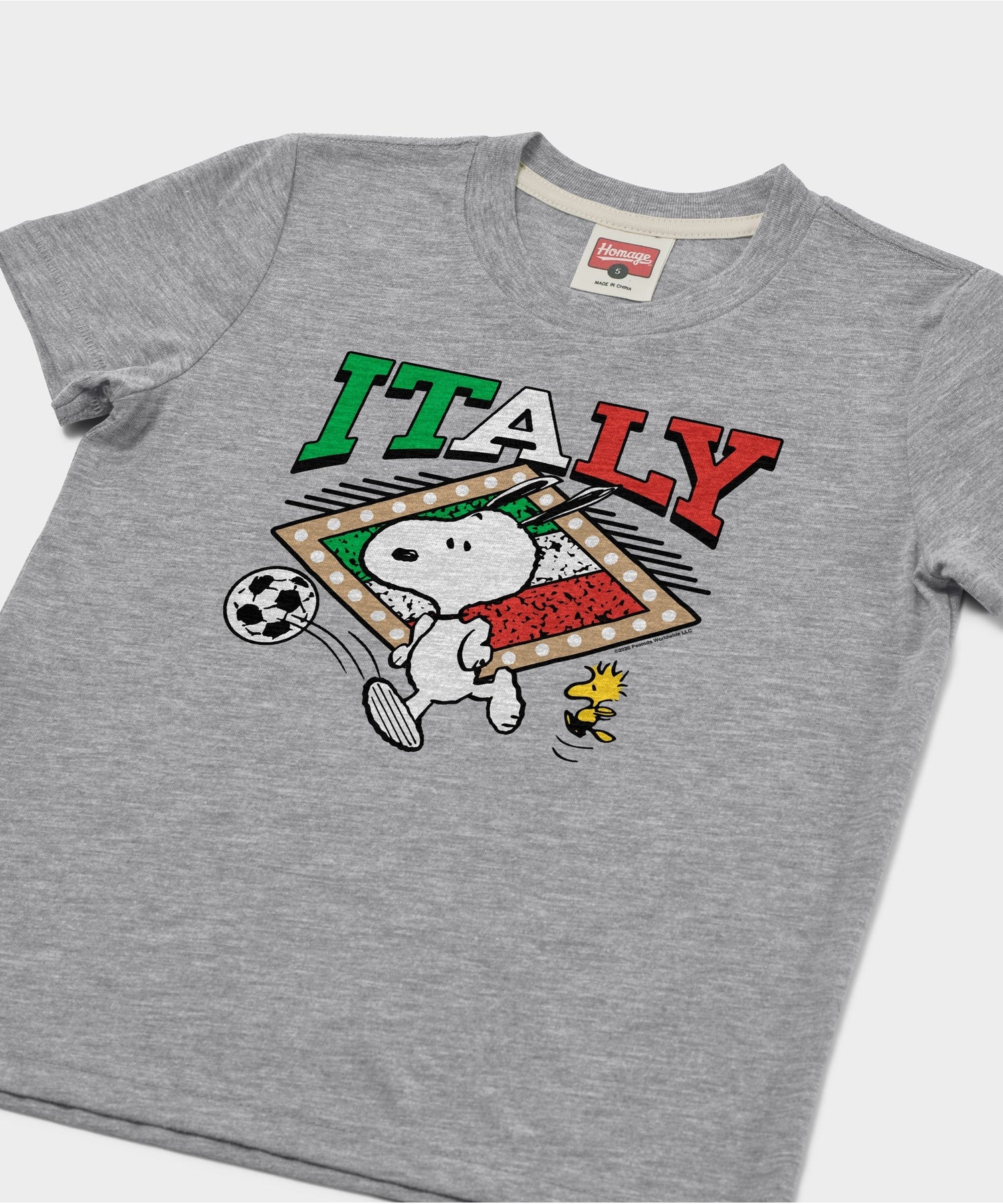 Close-up of the front graphic showing Snoopy with a soccer ball and Italy branding