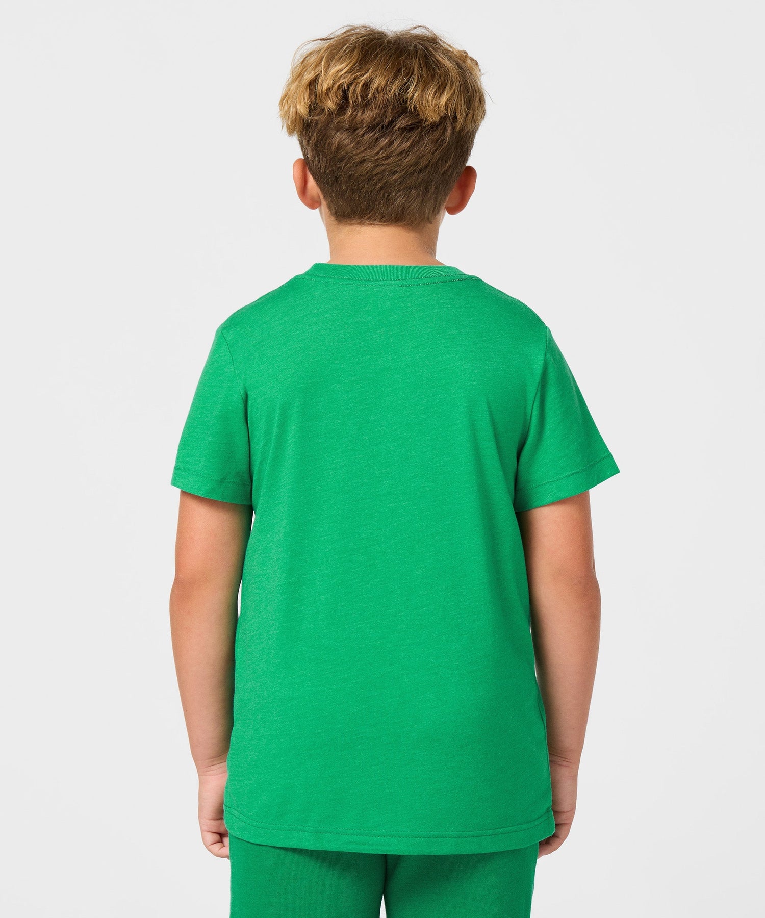 Close-up of the neckline label and fabric texture on the youth tee