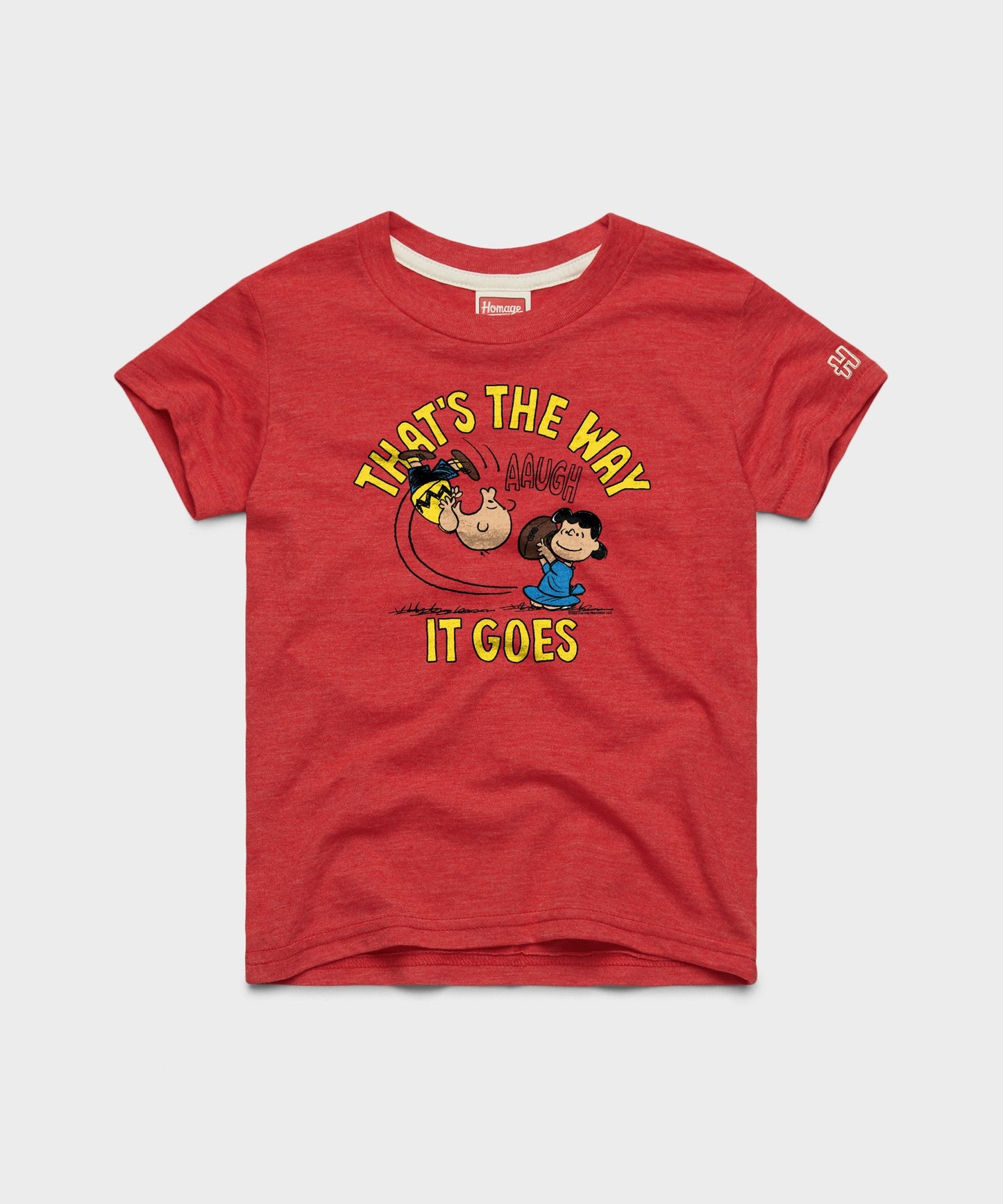 Red youth crewneck t-shirt featuring a vintage Charlie Brown graphic and the text That's The Way It Goes on the front chest