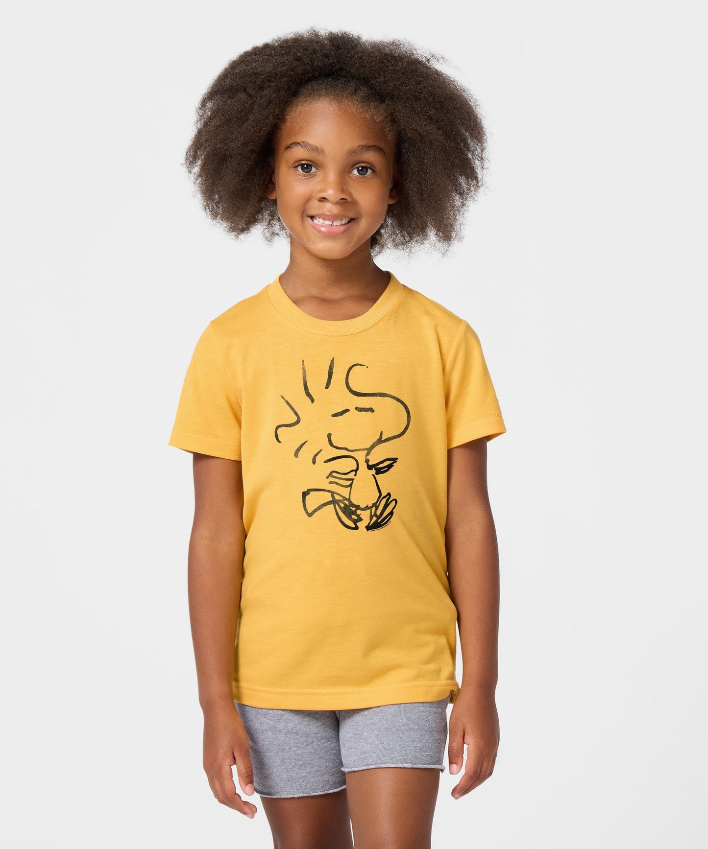 Side view of the youth t-shirt showing the sleeve and fit