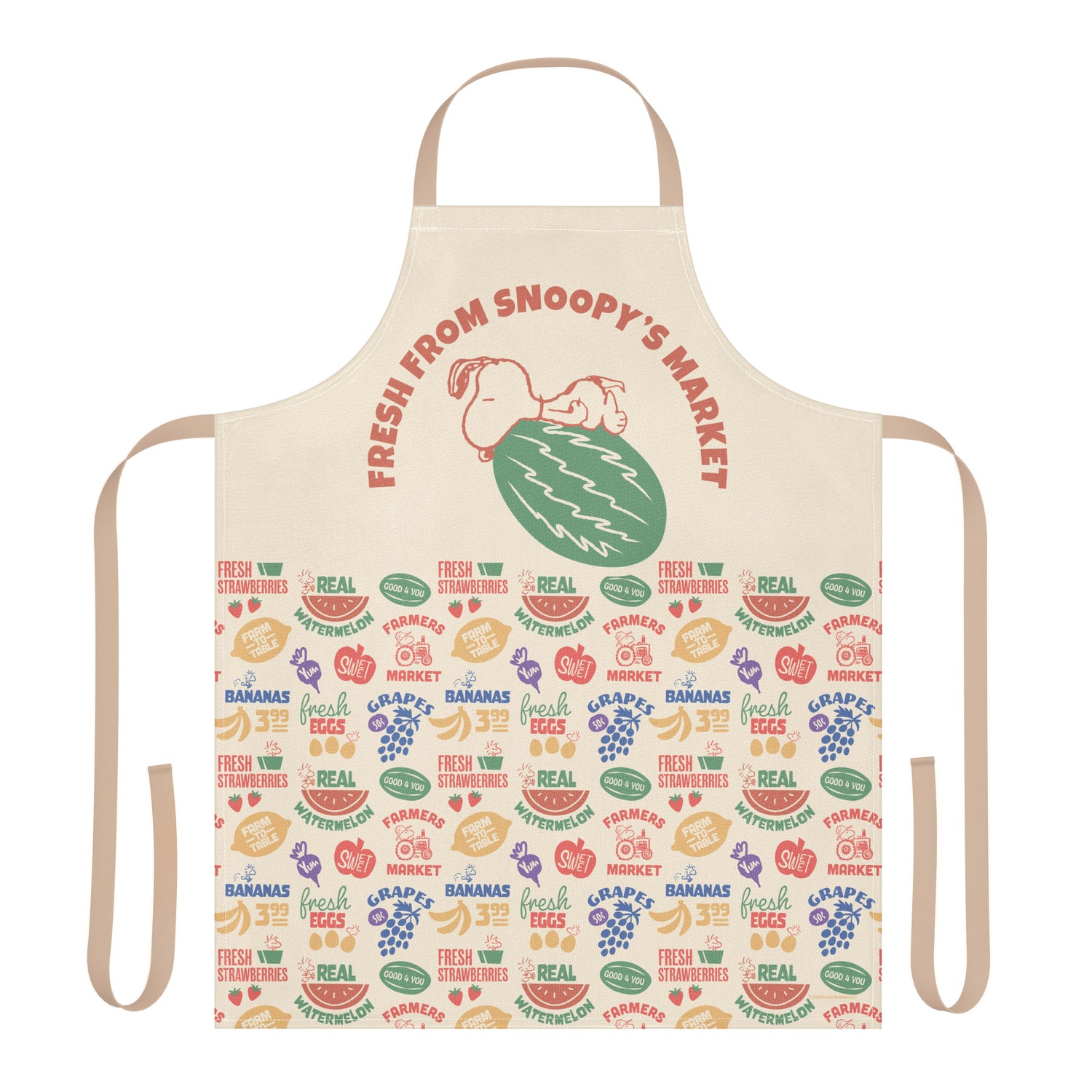A white Peanuts bib apron featuring a graphic of Snoopy at a market stall with the text Fresh From Snoopy’s Market.