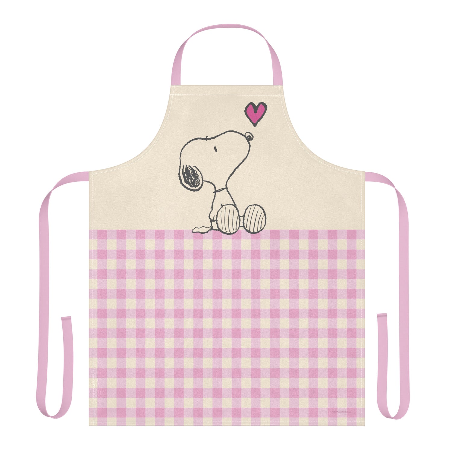 White Peanuts apron featuring Snoopy sitting next to a red heart