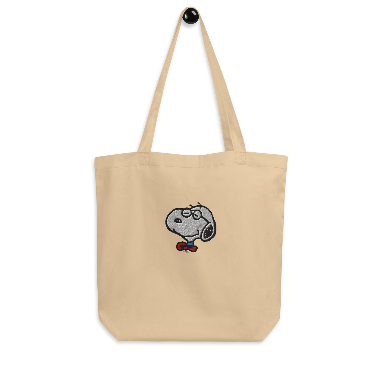 Detailed view of the durable organic cotton twill and embroidered lettering on the tote bag.