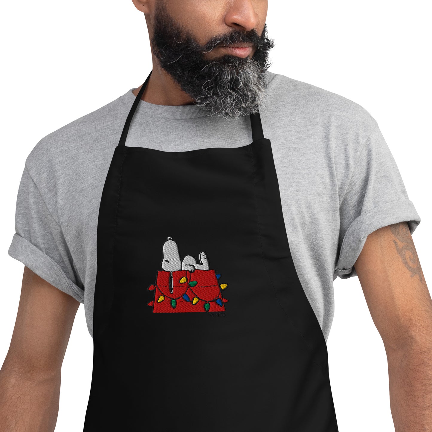 Folded apron product shot displaying the durable poly-cotton fabric texture