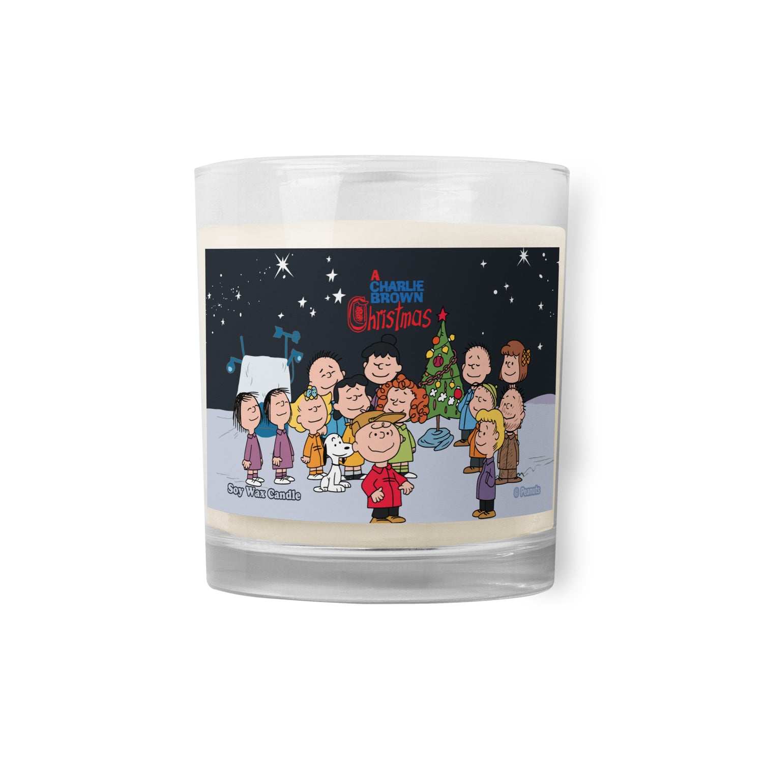 Glass jar soy wax candle featuring the Peanuts gang gathered together from A Charlie Brown Christmas on the front label