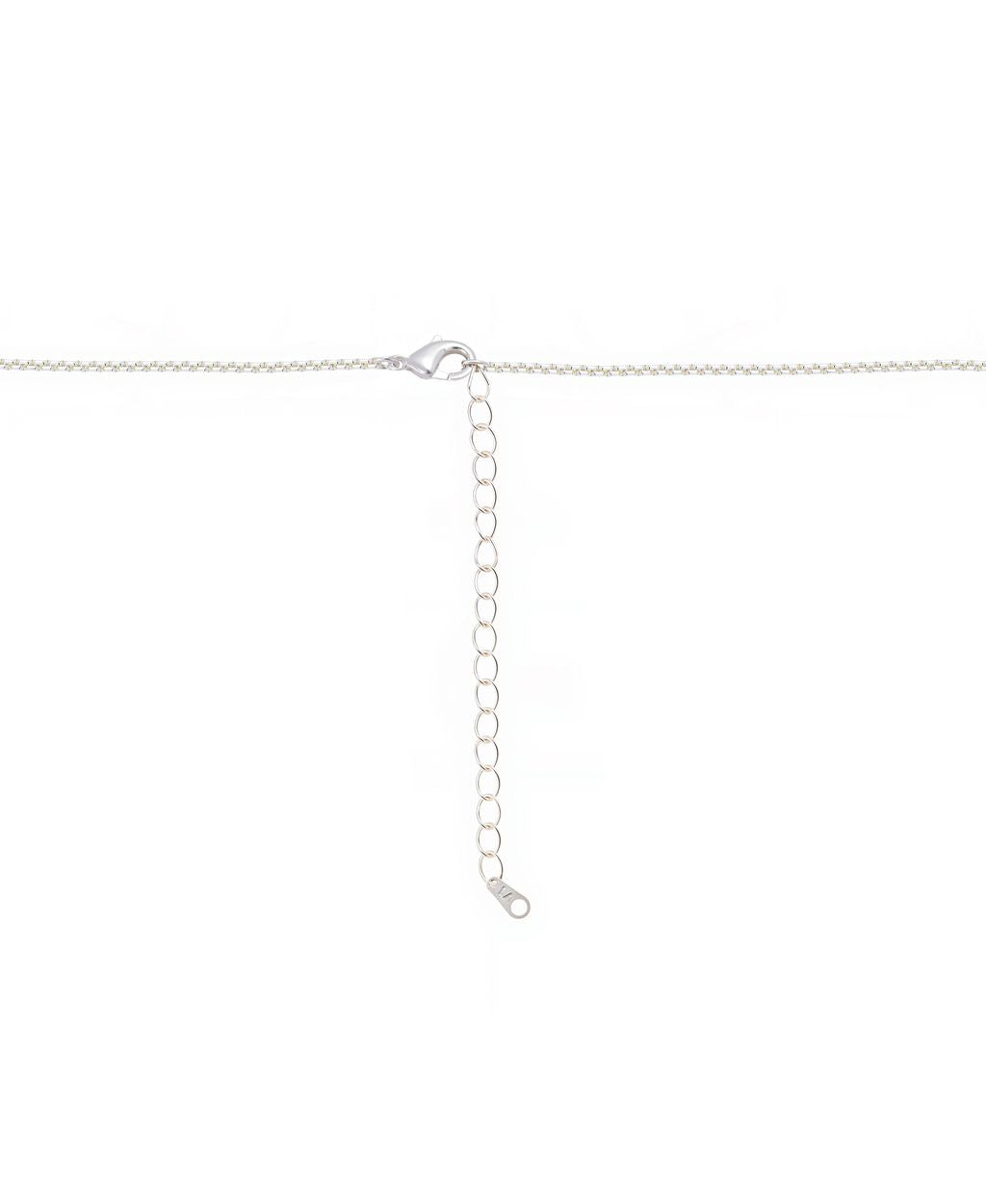 Angle view highlighting the polished finish and detailed engraving of the Snoopy pendant