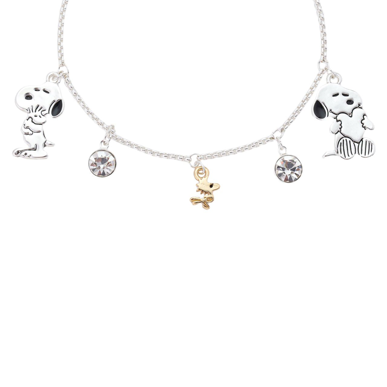 Lifestyle view of the Peanuts Snoopy and Woodstock bolo bracelet worn on a wrist