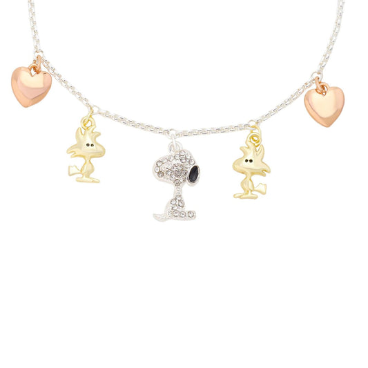 Peanuts bolo bracelet featuring a silver charm of Snoopy and Woodstock next to a crystal heart-1
