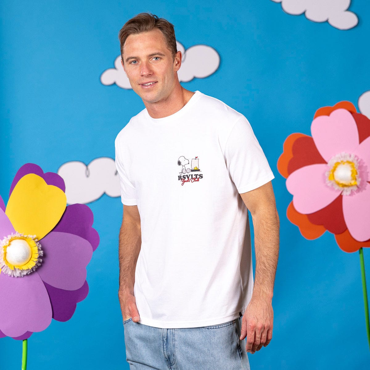 Folded view of the Peanuts Sailin' Away crewneck tee showcasing the overall design and colors