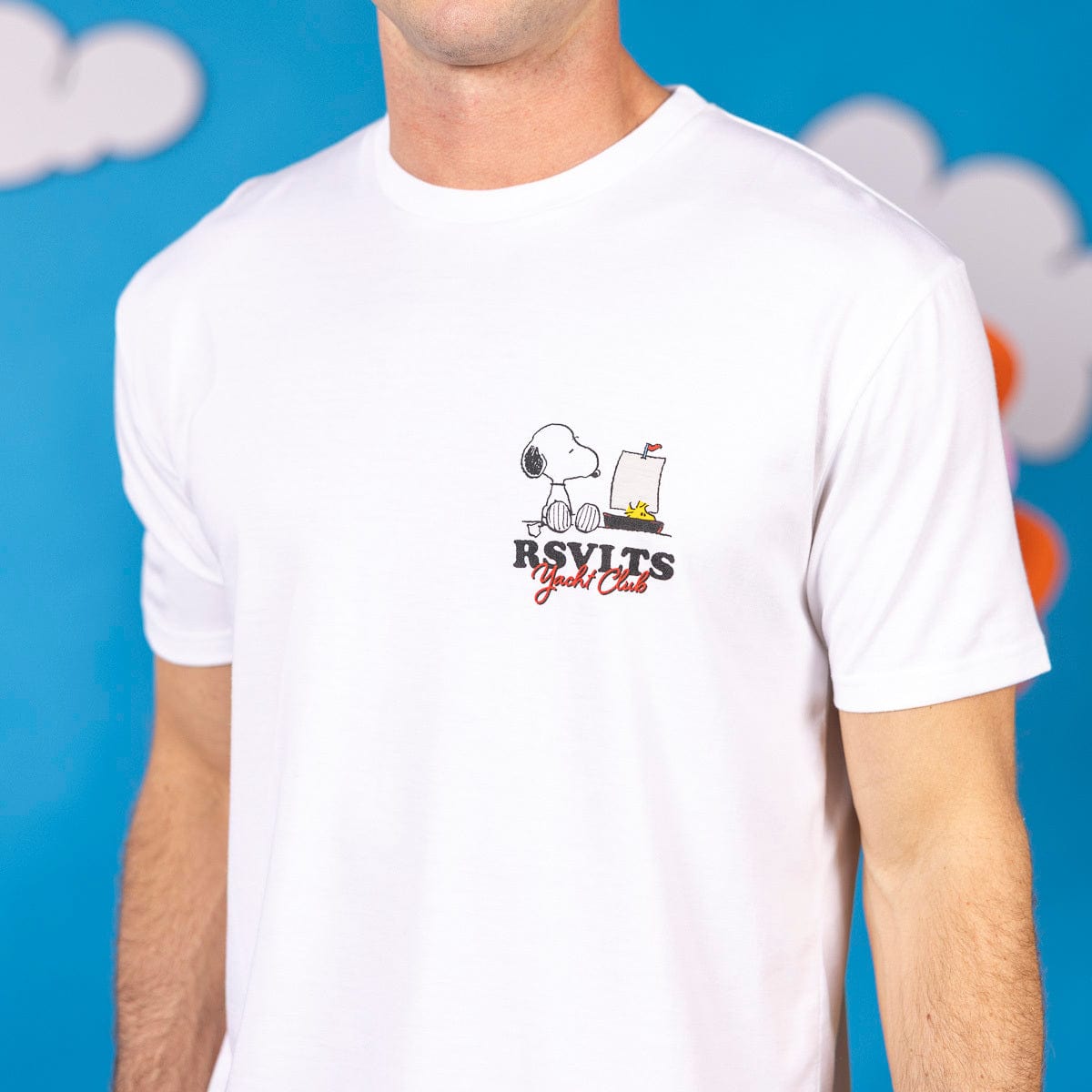 Close-up of the front chest graphic showing Snoopy and Woodstock in logo form on the tee