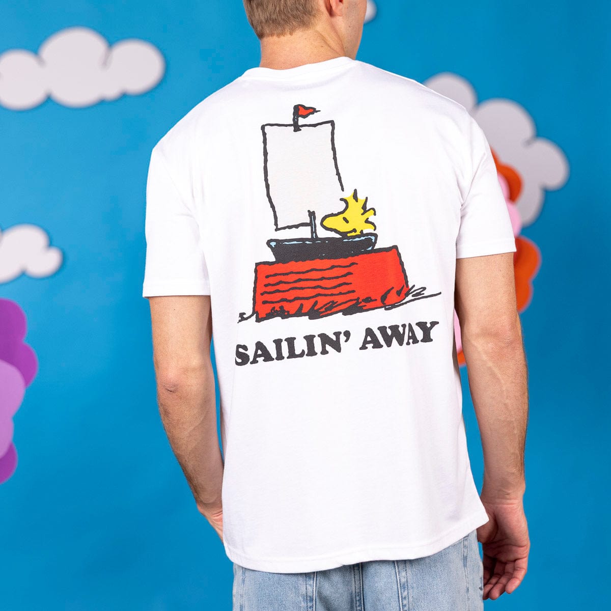 Back view of the Peanuts crewneck tee featuring a large graphic of Woodstock in a classic sailboat