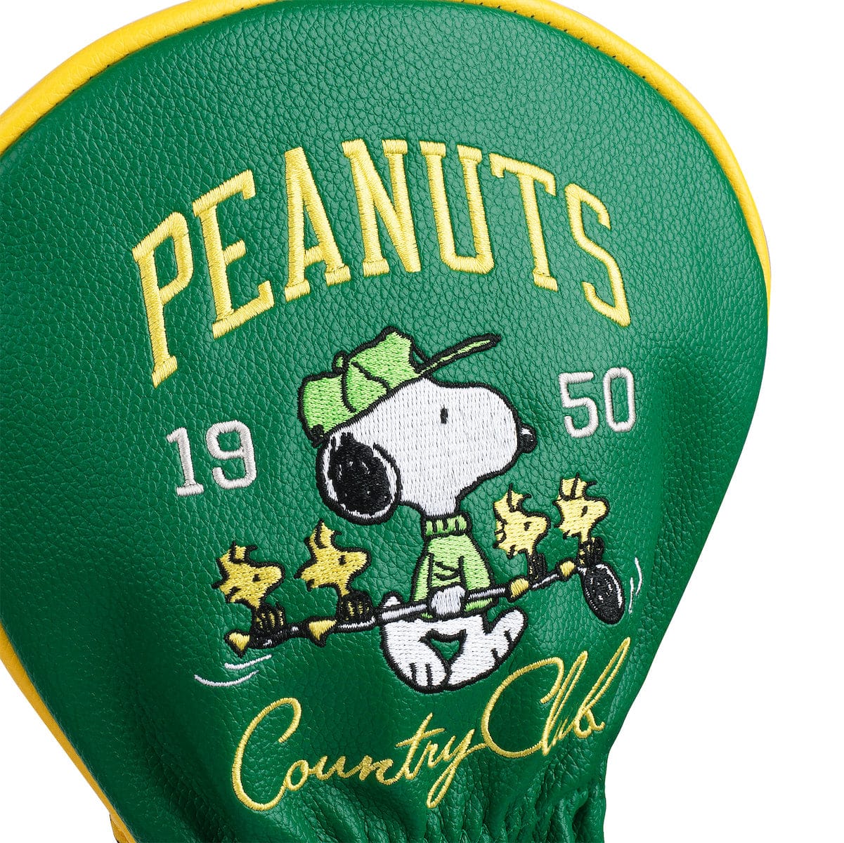 Peanuts Country Club driver headcover displayed on a golf club