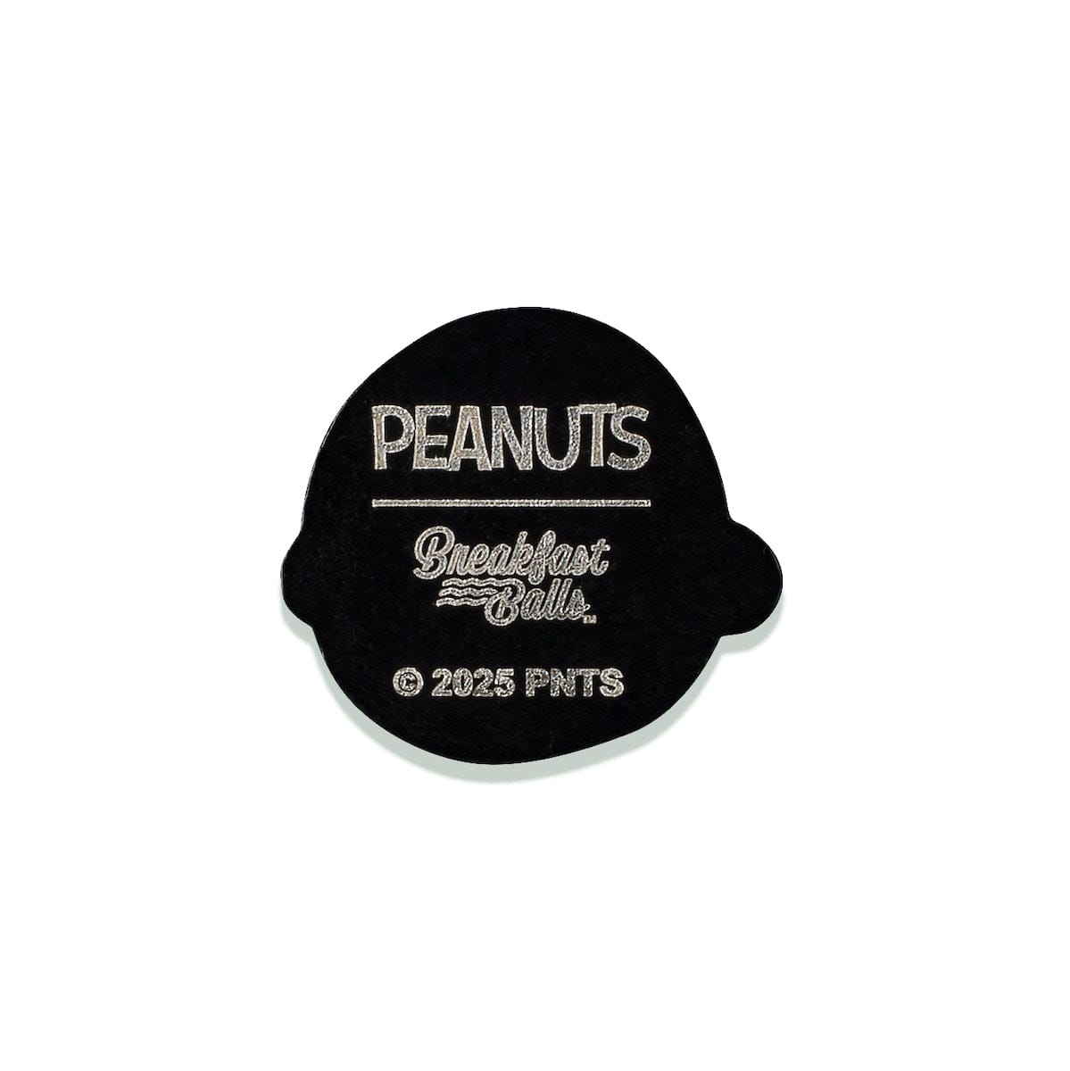 Back view of the Charlie Brown golf ball marker showing the smooth metal finish and engraved RSVLTS detailing