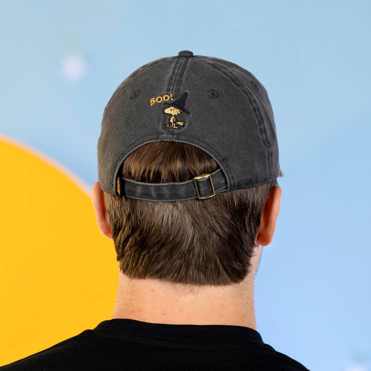 Close-up angle of the back embroidery featuring Woodstock