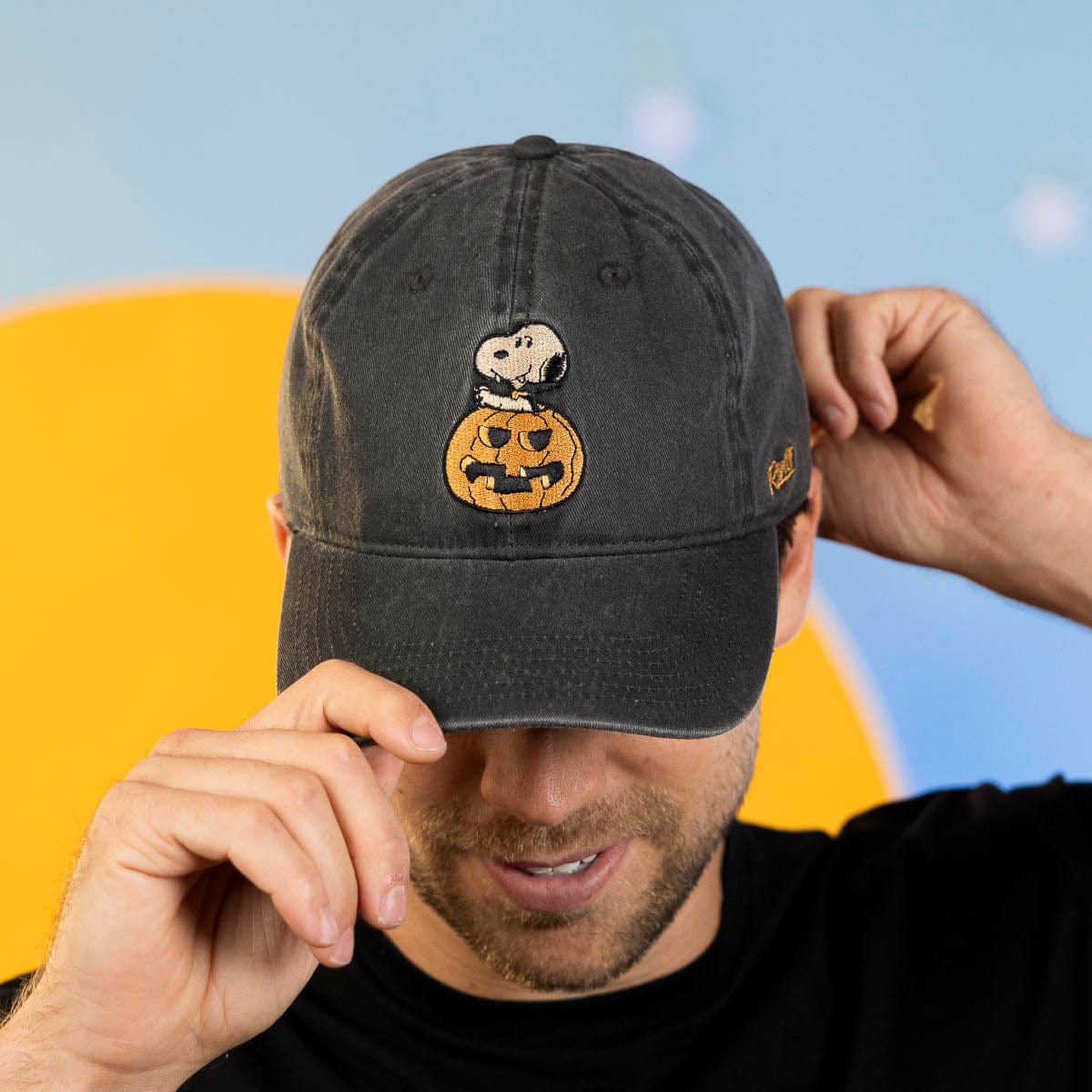 Back view of the same hat showing a bewitching Woodstock embroidered above the back strap