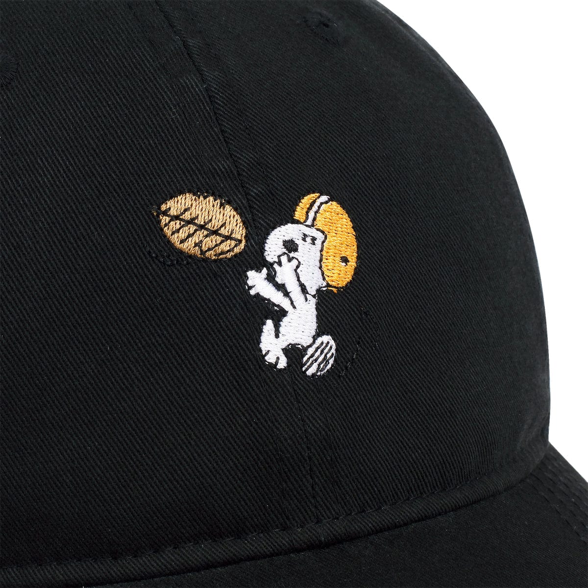 Side profile view of the adjustable dad hat showing the curved brim and paneled construction