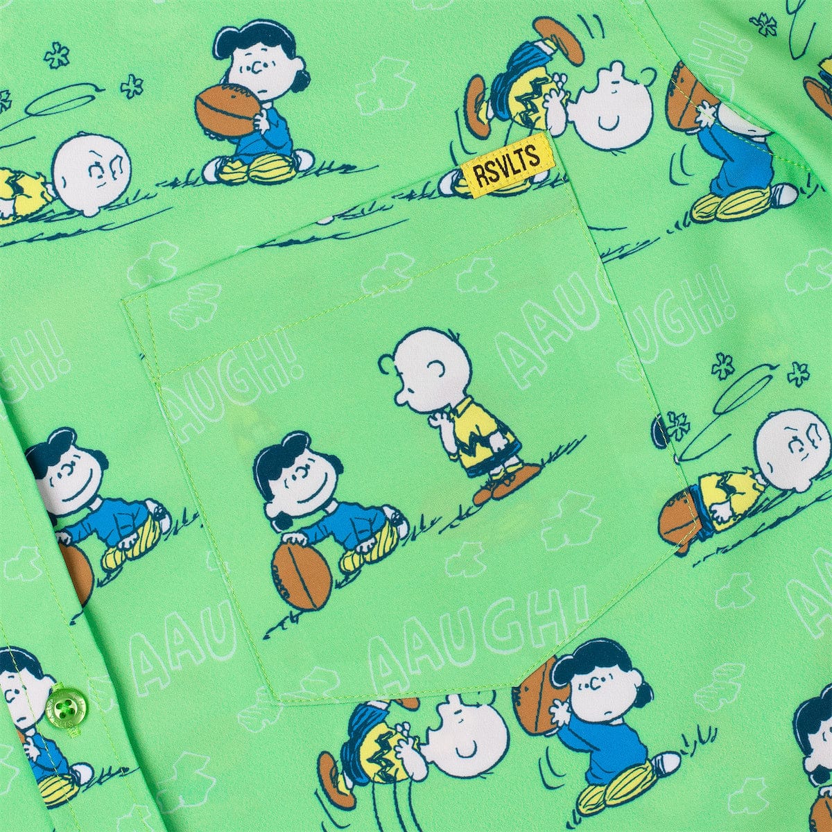 Detailed view of the KUNUFLEX fabric pattern showing Charlie Brown reaching for the football
