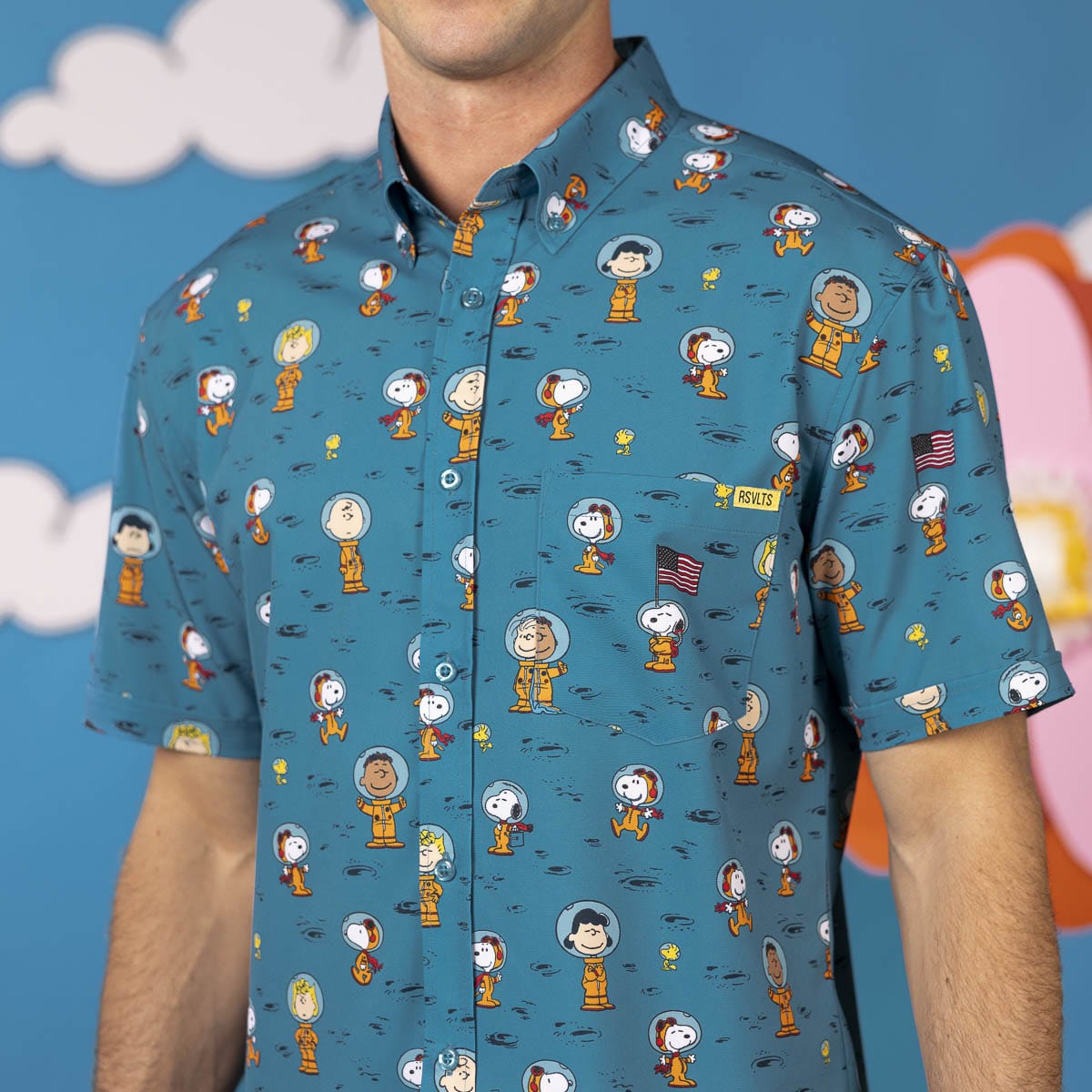 Detailed view of the button placket and collar styling on the Peanuts shirt