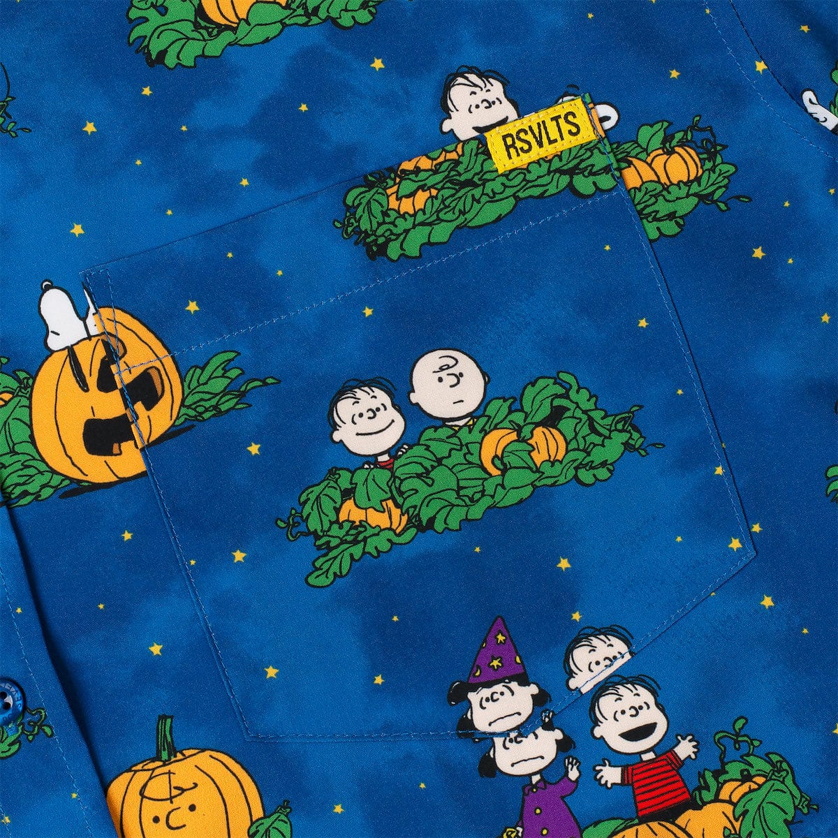 Detailed view of the button placket and collar on the Peanuts themed button-down shirt