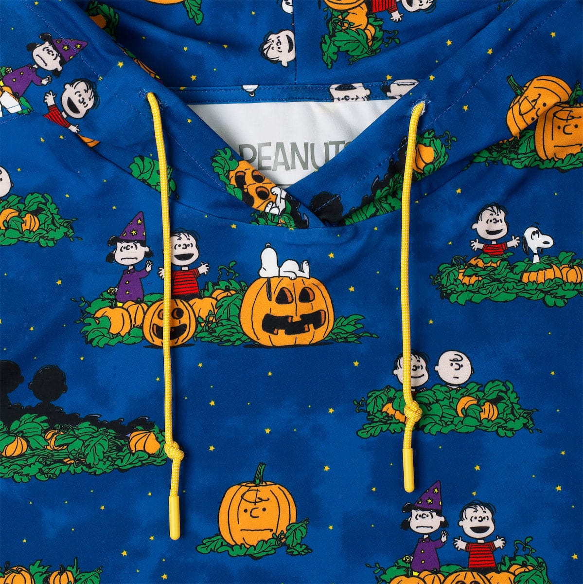 Back view of the Peanuts performance hoodie in a clean, solid finish
