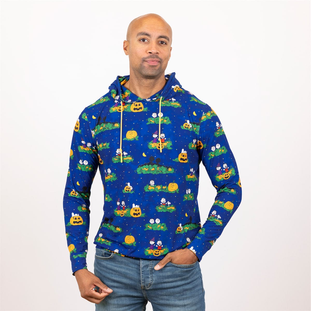 Close-up of the hoodie fabric showing the detailed cartoon crew illustration including Charlie Brown and Snoopy