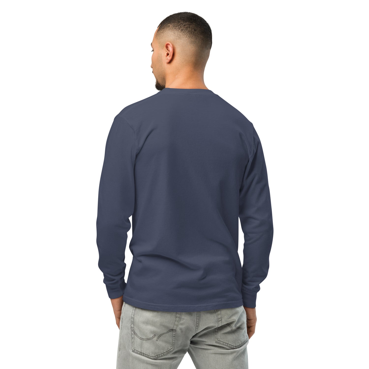 Close-up of the Fa La La La graphic printed across the front of the navy shirt